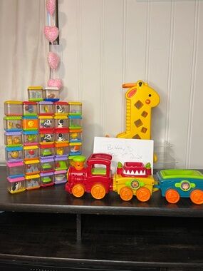 Fisher price peak a boo lot